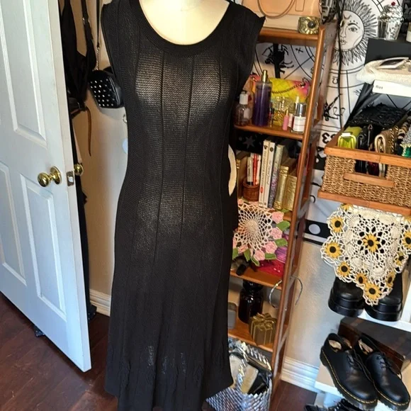 Caelian black open knit dress floral appliqué along lower hemline rounded neck